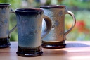 two cups three
